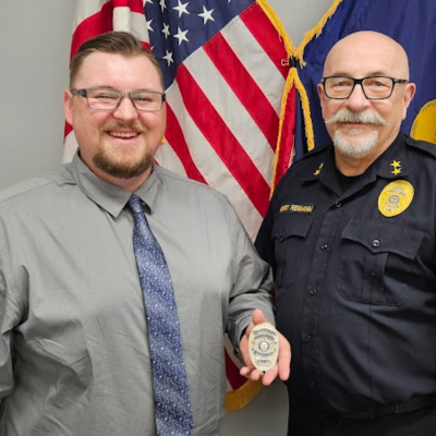 Officer Joey Haynes and FGPD Chief Henry Reimann