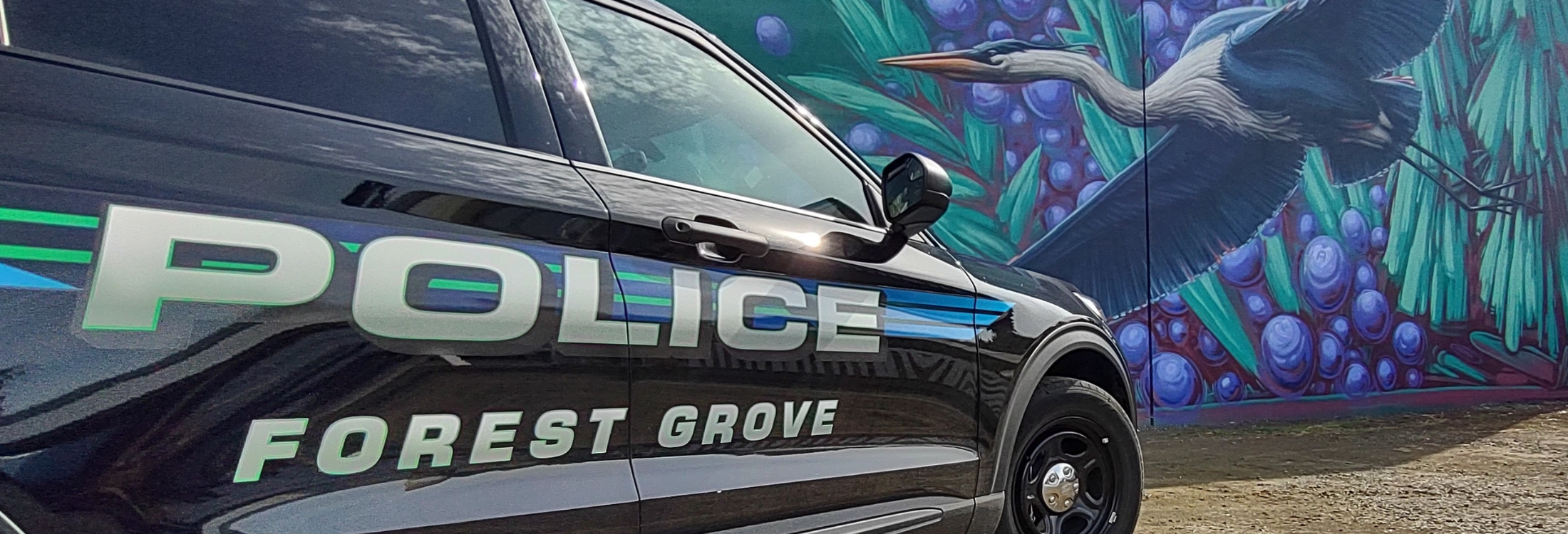 Forest Grove Police Car in front of Heron Mural